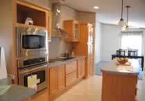 Stainless steel wall oven and upgraded range hood